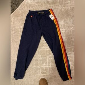 Aviator nation NWT navy/ rainbow stripped size M